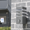 Zahradní lampa Nástěnná lampa TEKSAS PIR E27 IP44 senzor grafitový GOLDLUX (Polux)